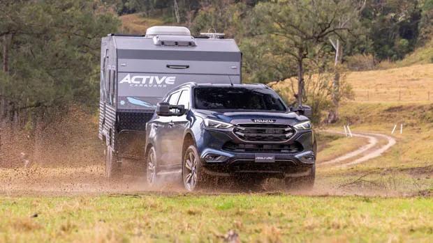 2023 Isuzu MU-X LS-T pulling a caravan