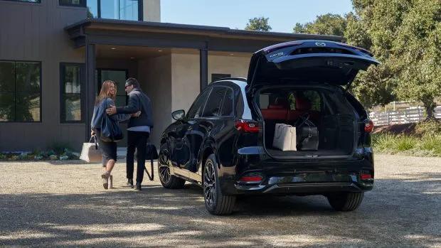 2024 Mazda CX-70 rear view boot open with people walking