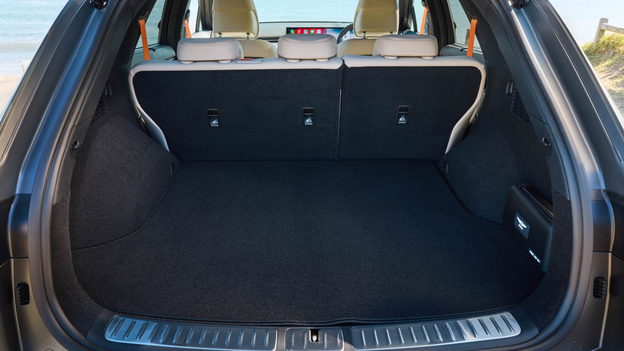 2025 Genesis GV70 Signature Sport interior boot open seats up
