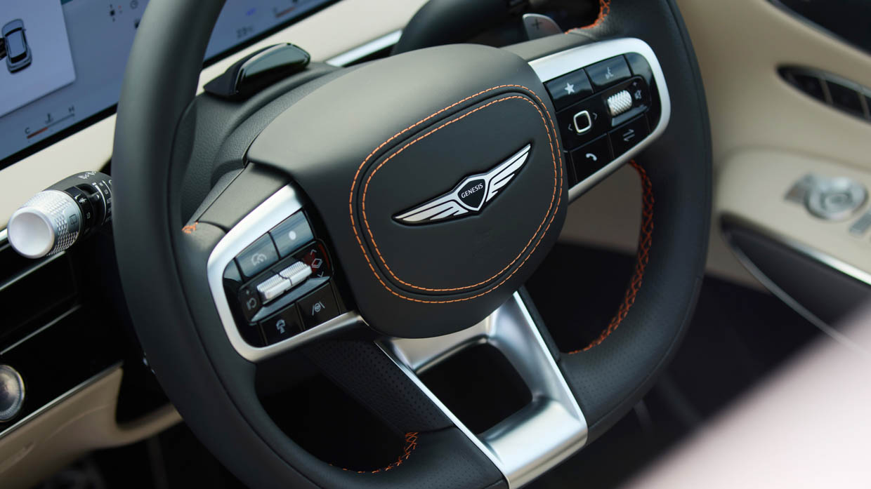 2025 Genesis GV70 Signature Sport interior steering wheel detail 2