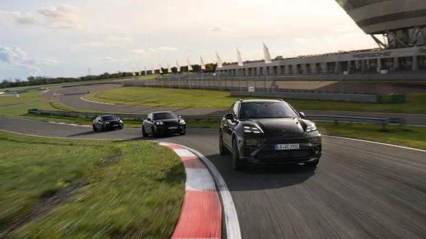 2024 Porsche Macan EV driving shot with group