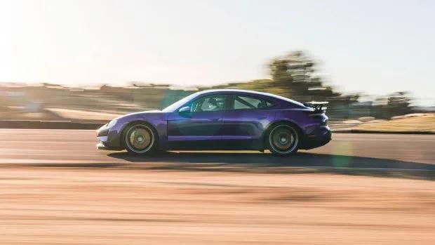 2024 Porsche Taycan Turbo GT Weissach Sky Purple Metallic side angle driving