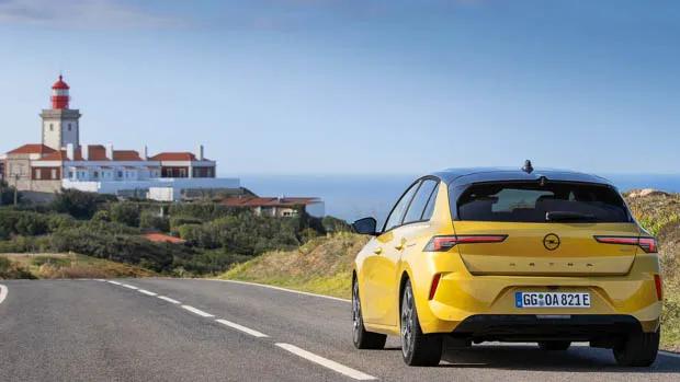 Opel Astra 2022 yellow seaside town