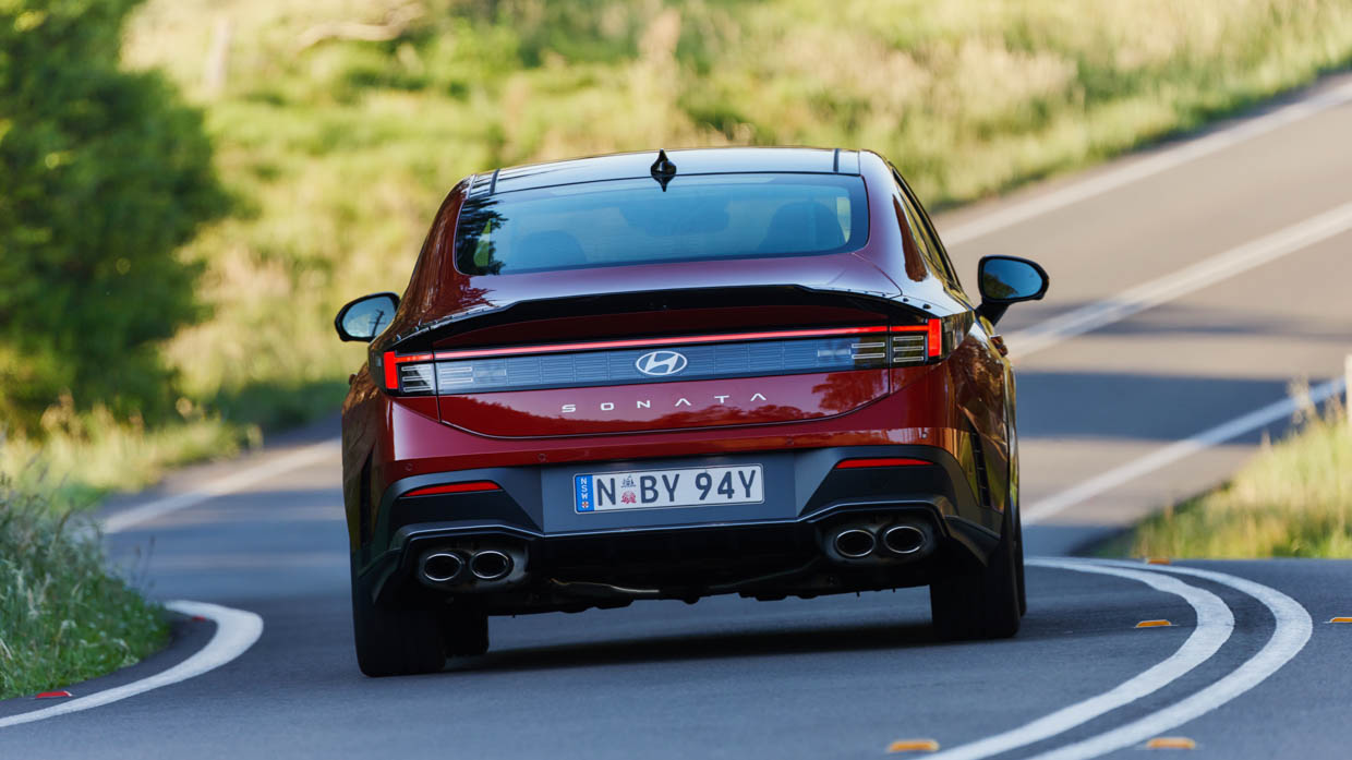 2024 Hyundai Sonata N-Line rear angle driving shot on road